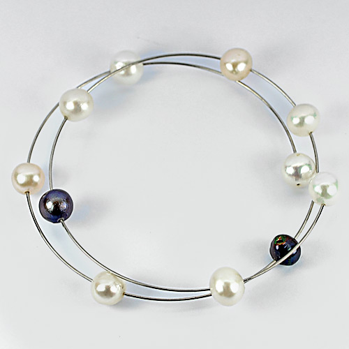 29.50 Ct. Lovely Natural Pearl Rhodium Plated Bangle Diameter 55 Mm. Free Size