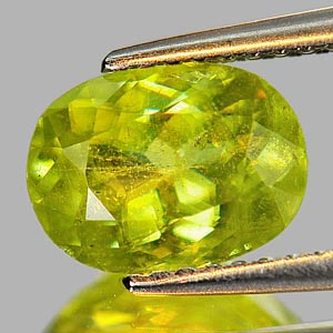 1.93 Ct. Oval Shape Natural Sphen Intense Yellowish Green With Rainbow Spark