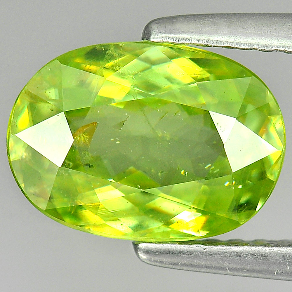 2.19 Ct. Oval Shape Natural Yellowish Green Titanium Sphene With Rainbow Spark