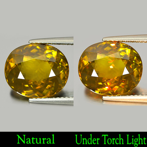 Multi Color Sphene  6.69 Ct. With Rainbow Spark Oval 12.7 x 10.9 Mm. Natural Gem