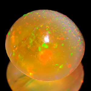 Good Luster 0.55 Ct. Round Cab Natural Multi Color Opal