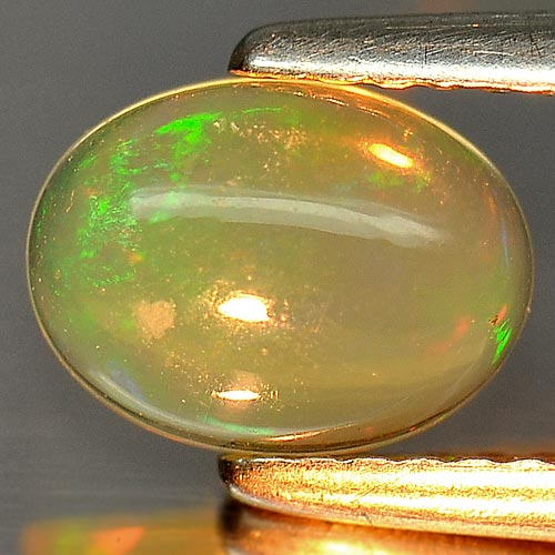 0.65 Ct. Good Oval Cabochon Natural Multi Color Play Of Colour Opal Gem