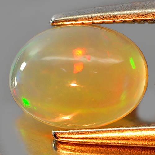 0.61 Ct. Oval Cabochon Natural Gem Multi Color Play Of Colour Opal