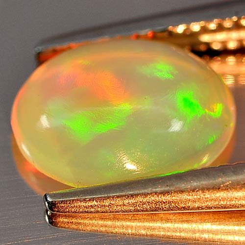 0.66 Ct. Attractive Oval Cab Natural Gem Multi Color Play Of Colour Opal