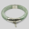 359.50 Ct. Natural Gemstone White Green Jade Bangle with Silver Size83x65x13Mm. 359.50 Ct. Natural Gemstone White Green Jade Bangle with Silver Size83x65x13Mm.