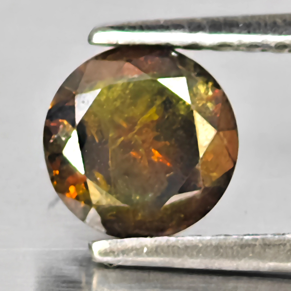 Natural Red Diamond 0.89 Ct. Round Brilliant Cut  5.9 Mm.