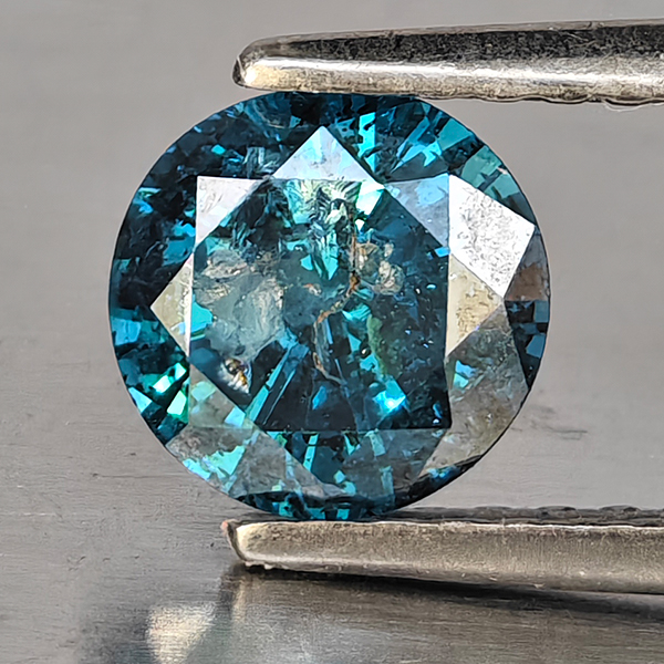 Natural Blue Diamond 0.79 Ct. Round Brilliant Cut  5.9 Mm.