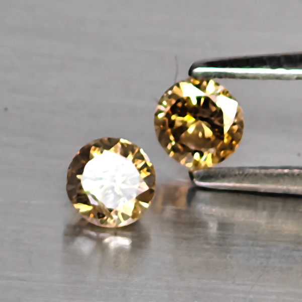 Natural Champagne Color Diamond 0.32 Ct. 2 Pcs. Round Diamond Cut 3.4 Mm. Natural Champagne Color Diamond 0.32 Ct. 2 Pcs. Round Diamond Cut 3.4 Mm.