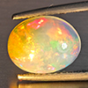 Natural Multi-Color Play Of Colour Opal 2.29 Ct. Oval Cabochon Shape 10.8 x 8.6 Mm Gemstone Ethiopia Natural Multi-Color Play Of Colour Opal 2.29 Ct. Oval Cabochon Shape 10.8 x 8.6 Mm Gemstone Ethiopia