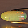 Natural Multi-Color Play Of Colour Opal Gemstone 2.55 Ct. Oval Cabochon Shape 17.3 x 7.3 Mm Natural Multi-Color Play Of Colour Opal Gemstone 2.55 Ct. Oval Cabochon Shape 17.3 x 7.3 Mm