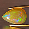 Natural Multi-Color Play Of Colour Opal Gemstone 3.59 Ct. Pear Cabochon Shape 15 x 10.4 Mm. Natural Multi-Color Play Of Colour Opal Gemstone 3.59 Ct. Pear Cabochon Shape 15 x 10.4 Mm.