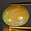 Natural Multi-Color Play Of Colour Opal Gemstone 4.19 Ct. Oval Cabochon Shape 15.4 x 12.3 Mm Natural Multi-Color Play Of Colour Opal Gemstone 4.19 Ct. Oval Cabochon Shape 15.4 x 12.3 Mm