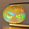 Natural Multi-Color Play Of Colour Opal Gemstone 1.67 Ct. Oval Cabochon Shape 10.5 x 7.9 Mm Natural Multi-Color Play Of Colour Opal Gemstone 1.67 Ct. Oval Cabochon Shape 10.5 x 7.9 Mm