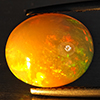 Natural Multi-Color Play Of Colour Opal Gemstone 2.22 Ct. Oval Cabochon Shape 10 x 8 Mm. Natural Multi-Color Play Of Colour Opal Gemstone 2.22 Ct. Oval Cabochon Shape 10 x 8 Mm.