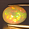 Natural Multi-Color Play Of Colour Opal Gemstone 3.15 Ct. Oval Cabochon Shape 11.9 x 9.1 Mm. Natural Multi-Color Play Of Colour Opal Gemstone 3.15 Ct. Oval Cabochon Shape 11.9 x 9.1 Mm.