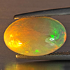 Natural Multi-Color Play Of Colour Opal Gemstone 2.75 Ct. Oval Cabochon Shape 13.3 x 8.5 Mm Natural Multi-Color Play Of Colour Opal Gemstone 2.75 Ct. Oval Cabochon Shape 13.3 x 8.5 Mm