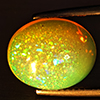 Natural Multi-Color Play Of Colour Opal Gemstone 4.43 Ct. Oval Cabochon Shape 13.4 x 10.8 Mm Natural Multi-Color Play Of Colour Opal Gemstone 4.43 Ct. Oval Cabochon Shape 13.4 x 10.8 Mm