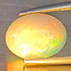 Natural Multi-Color Play Of Colour Opal Gemstone 1.53 Ct. Oval Cabochon Shape 10.6 x 8 Mm. Natural Multi-Color Play Of Colour Opal Gemstone 1.53 Ct. Oval Cabochon Shape 10.6 x 8 Mm.