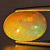 Natural Multi-Color Play Of Colour Opal Gemstone 3.63 Ct. Oval Cabochon Shape 12.8 x 9.1 Mm. Natural Multi-Color Play Of Colour Opal Gemstone 3.63 Ct. Oval Cabochon Shape 12.8 x 9.1 Mm.