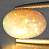 Natural Multi-Color Play Of Colour Opal Gemstone 1.37 Ct. Oval Cabochon Shape 10.5 x 7.3 Mm. Natural Multi-Color Play Of Colour Opal Gemstone 1.37 Ct. Oval Cabochon Shape 10.5 x 7.3 Mm.