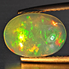 Natural Multi-Color Play Of Colour Opal Gemstone 2.34 Ct. Oval Cabochon Shape 12 x 8.5 Mm. Natural Multi-Color Play Of Colour Opal Gemstone 2.34 Ct. Oval Cabochon Shape 12 x 8.5 Mm.