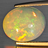 Natural Multi-Color Play Of Colour Opal Gemstone 3.17 Ct. Oval Cabochon Shape 12.6 x 10.5 Mm. Natural Multi-Color Play Of Colour Opal Gemstone 3.17 Ct. Oval Cabochon Shape 12.6 x 10.5 Mm.