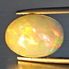 Natural Multi-Color Play Of Colour Opal Gemstone 1.92 Ct. Oval Cabochon Shape 10.1 x 8.2 Mm. Natural Multi-Color Play Of Colour Opal Gemstone 1.92 Ct. Oval Cabochon Shape 10.1 x 8.2 Mm.