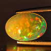 Natural Multi-Color Play Of Colour Opal Gemstone 2.17 Ct. Oval Cabochon Shape 12 x 8.5 Mm. Natural Multi-Color Play Of Colour Opal Gemstone 2.17 Ct. Oval Cabochon Shape 12 x 8.5 Mm.