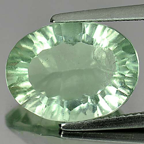 7.32 Ct. Oval Concave Cut 14.3 x 10.7 Mm. Natural Gem Green Fluorite Unheated