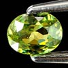 Unheated 0.43 Ct. Oval Natural Green Demantoid Garnet Unheated 0.43 Ct. Oval Natural Green Demantoid Garnet