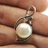 3.04 G. Round Cabochon Natural White Pearl Rhodium Silver Plated Pendant 3.04 G. Round Cabochon Natural White Pearl Rhodium Silver Plated Pendant