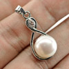 2.91 G. Round Cabochon Natural White Pearl Rhodium Silver Plated Pendant 2.91 G. Round Cabochon Natural White Pearl Rhodium Silver Plated Pendant