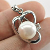 2.84 G. Natural White Pearl Rhodium Silver Plated Pendant Round Cabochon 2.84 G. Natural White Pearl Rhodium Silver Plated Pendant Round Cabochon