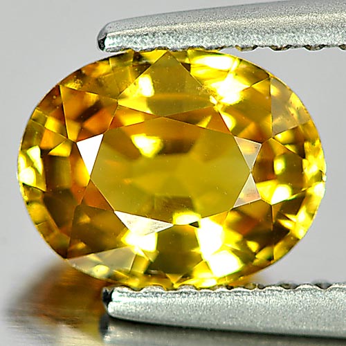 Orangish Yellow Sapphire 1.57 Ct. Oval Shape 7.7 x 6.1 Mm. Natural Gem Thailand