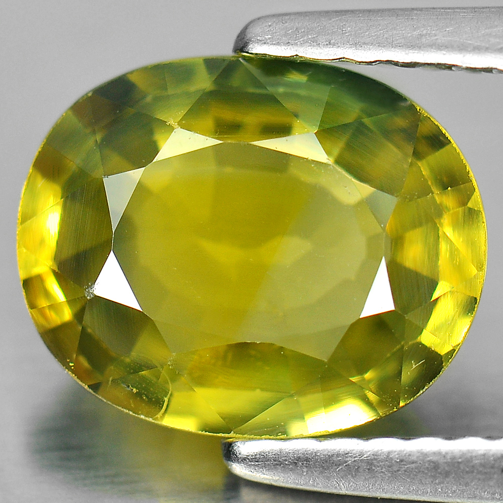 Sapphire Greenish Yellow 2.57 Ct. Oval 9.5 x 7.6 Mm. Natural Gemstone Thailand
