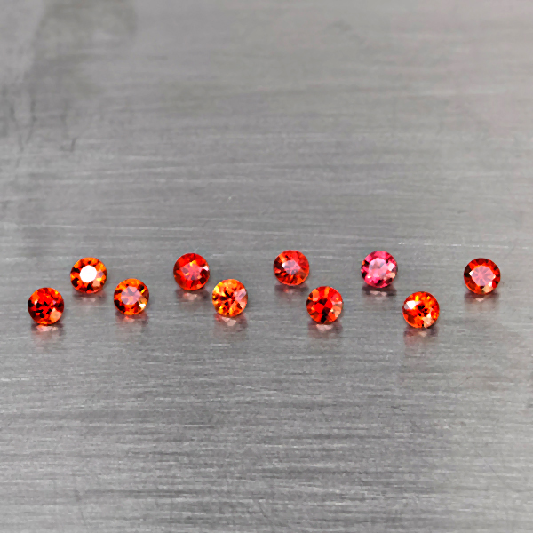 Natural Orangish Red Songea Sapphire 1.14 Ct. 15 Pcs. Round Diamond Cut  2.4 Mm.