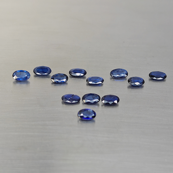 Natural Diffusion Deep Blue Sapphire Gemstones 2.73 Ct. 12 Pcs. Oval Shape 5 x 3.2 Mm. Natural Diffusion Deep Blue Sapphire Gemstones 2.73 Ct. 12 Pcs. Oval Shape 5 x 3.2 Mm.