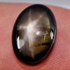 7.77 Ct. Oval Cab Natural Black Star Sapphire 6 Rays