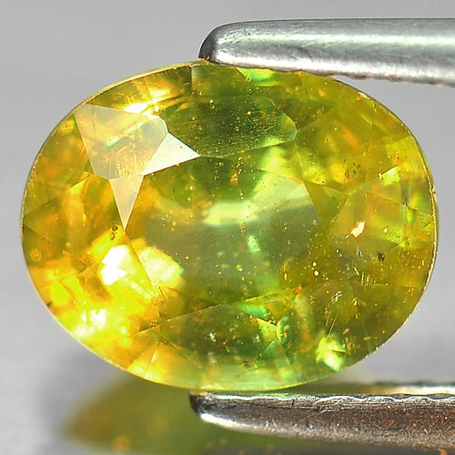 Green Sphene Red Spark 2.26 Ct. Oval 9.2 x 7.4 Mm. Natural Gemstone Unheated