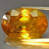 Intense Green Titanium Sphene Red Spark 15.89 Ct. Oval 19.7 x 13.4 Mm. Natural
