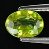 0.73 Ct. Natural Intense Green Titanium Sphene Red Spark