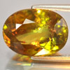 Intense Green Titanium Sphene Red Spark Oval 16.2 x 10.9 Mm. 10.48 Ct. Natural Intense Green Titanium Sphene Red Spark Oval 16.2 x 10.9 Mm. 10.48 Ct. Natural