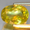 Green Titanium With Rainbow Spark Sphene 2.42 Ct. Oval 9.6 x 6.3 Mm. Natural Gem