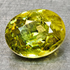 Natural Sphene Intense Yellow Green Titanium Red Spark 0.93 Ct. Oval Shape