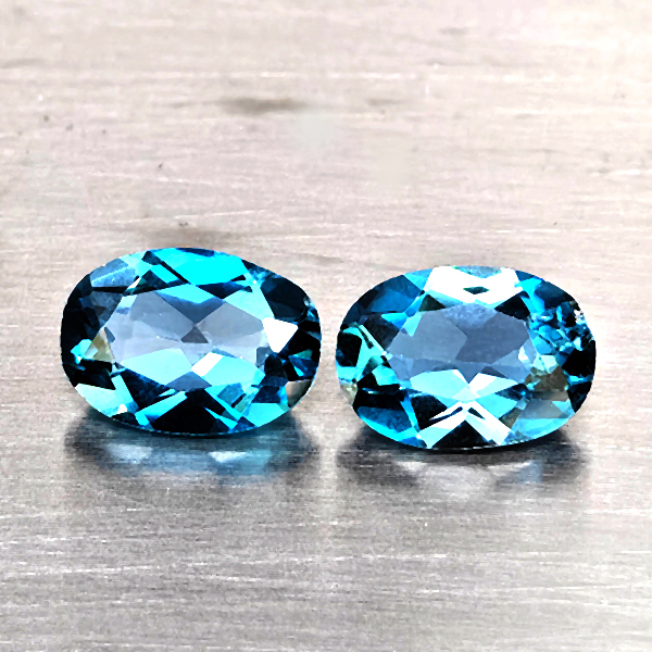 Natural London Blue Topaz Gemstones 1.81 Ct. 2 Pcs. Oval Shape 7.2 x 5.1 Mm. Natural London Blue Topaz Gemstones 1.81 Ct. 2 Pcs. Oval Shape 7.2 x 5.1 Mm.