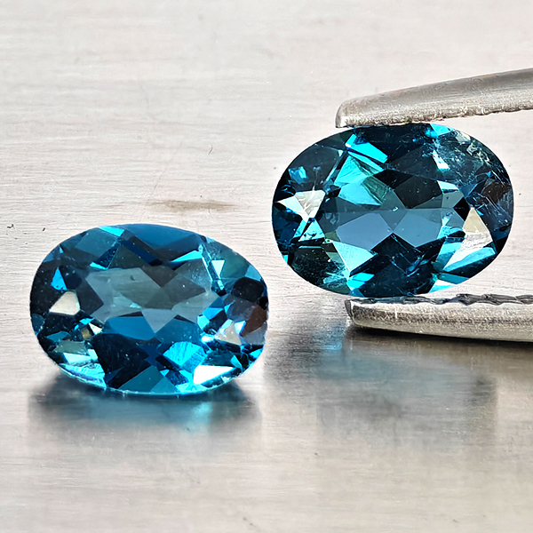 Natural London Blue Topaz Gemstones 1.72 Ct. 2 Pcs. Oval Shape 7.3 x 5.2 Mm. Natural London Blue Topaz Gemstones 1.72 Ct. 2 Pcs. Oval Shape 7.3 x 5.2 Mm.