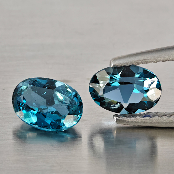 Natural London Blue Topaz Gemstones 1.95 Ct. 2 Pcs. Oval Shape 7 x 5.2 Mm. Natural London Blue Topaz Gemstones 1.95 Ct. 2 Pcs. Oval Shape 7 x 5.2 Mm.