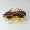 128.04 Ct.  Natural Oval Cab Red Ruby with Round Red Garnet Spider Brooch Nickel