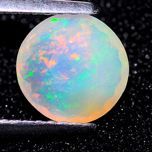0.72 Ct. Round 7.3 Mm. Natural Multi Color Opal