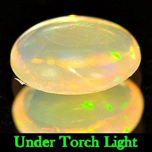 Unheated 0.52 Ct. Oval Cab Natural Multi Color Opal Gem